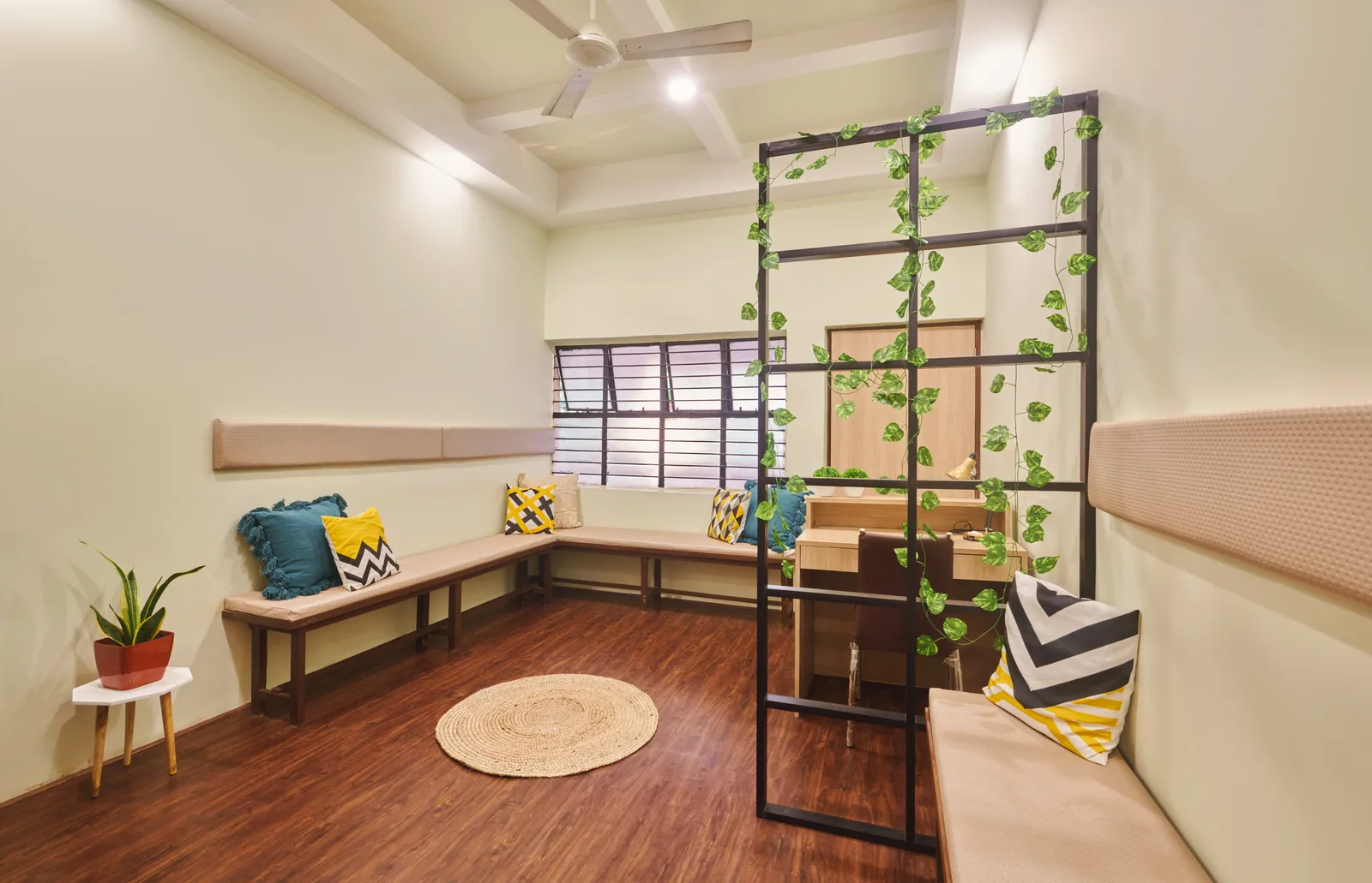 Natural light and vibrant colours create a welcoming atmosphere in the waiting area.