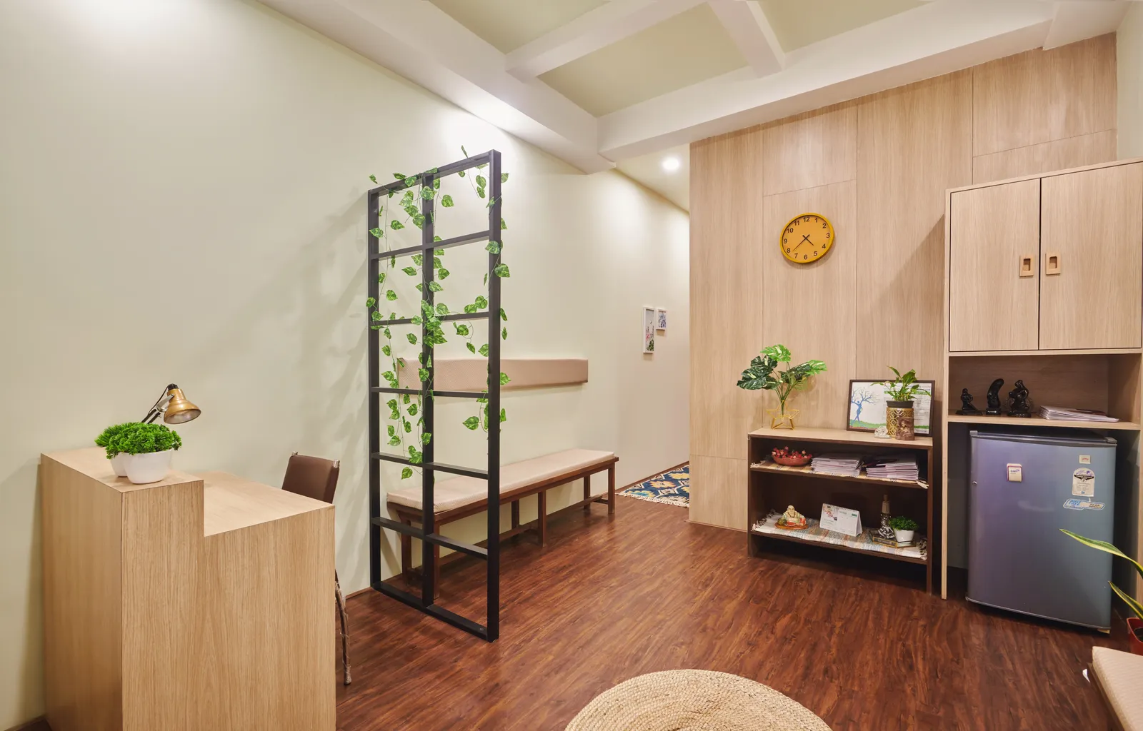 The waiting area welcomes patients with a calming ambience and functional design.